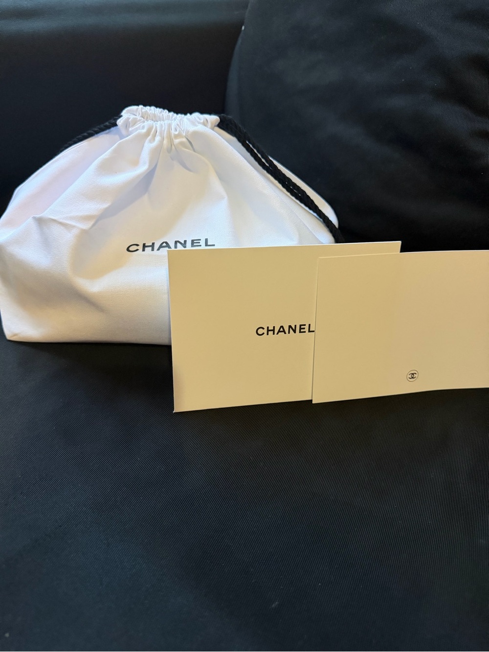 CHANEL White Drawstring Pouch with Black Cord and Cards